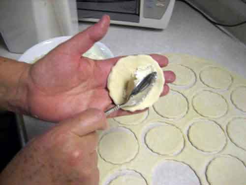 stuffing pierogi dough